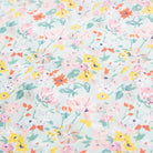 Ruffle sleeve summer dress with square empire line and loose, floaty fit. Attached gathered skirt sits at or below the knee to create a full shape. Made from beautifully soft Liberty print California Bloom tana lawn cotton.
