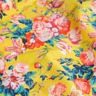 Comfy jumpsuit with loosely fitted wrap over top and tie up shoulder straps. Loose fitting straight leg trousers can be styled with a rolled up hem, turned down for growth spurts. Made from beautifully soft, Magical Bouquet Liberty print linen.