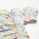 Ruffle sleeve summer dress with square empire line and loose, floaty fit. Attached gathered skirt sits at or below the knee to create a full shape. Made from beautifully soft Liberty print California Bloom tana lawn cotton.