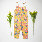 Comfy jumpsuit with loosely fitted wrap over top and tie up shoulder straps. Loose fitting straight leg trousers can be styled with a rolled up hem, turned down for growth spurts. Made from beautifully soft, Magical Bouquet Liberty print linen.