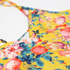 Comfy jumpsuit with loosely fitted wrap over top and tie up shoulder straps. Loose fitting straight leg trousers can be styled with a rolled up hem, turned down for growth spurts. Made from beautifully soft, Magical Bouquet Liberty print linen.