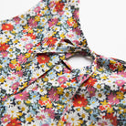 Simple A-line shaped pinafore dress with front pockets and tie at the back of the neck. Designed to sit above the knee and is perfect layered over an NQ blouse or stripped back in warmer weather. Made from beautiful Libby Liberty print tana lawn cotton.